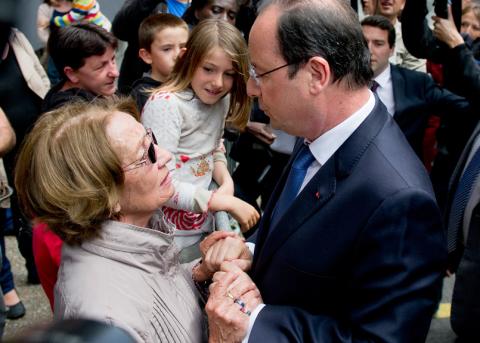 rançois Hollande und eine Wählerin